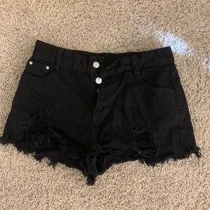 Ripped raw hem button fly denim shorts